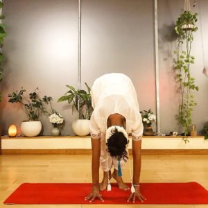Charisma Whitefeather from Siesta Yoga in Los Angeles demonstrating the up position of the Kundalini Yoga Frog Pose